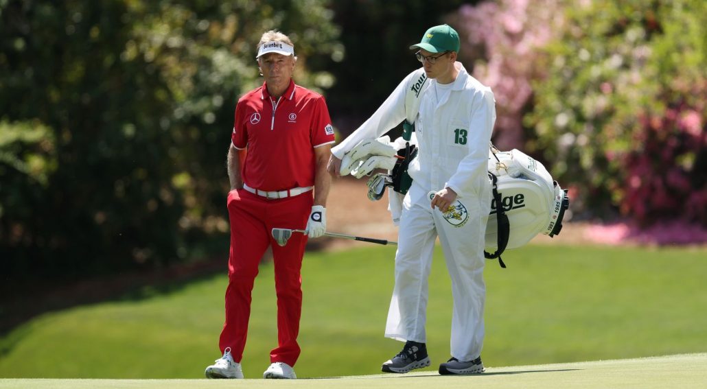 Bernhard Langer of Germany interacts with his son and caddie, Jason Langer, on the 13th green during the first round of the 2025 Masters Tournament at Augusta National Golf Club on April 10, 2025 in Augusta, Georgia. (Photo by Richard Heathcote/Getty Images)
