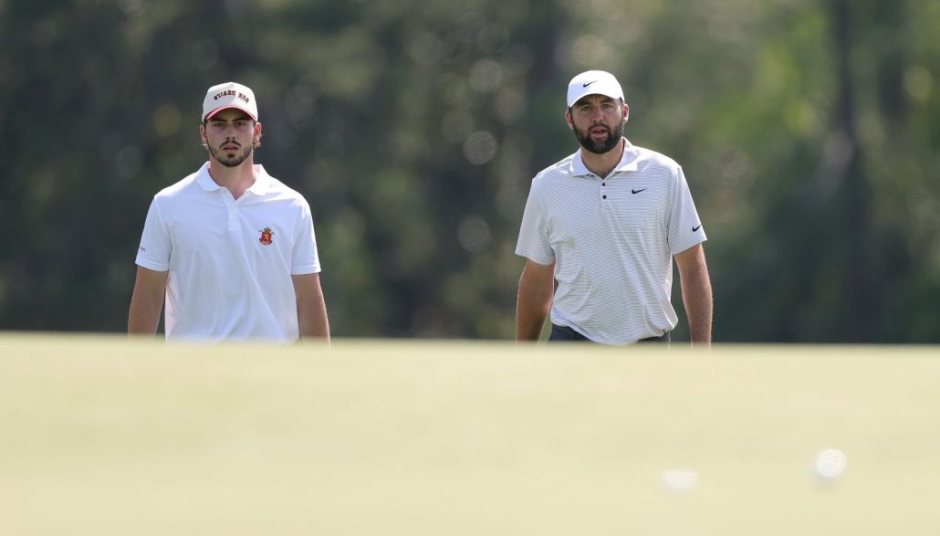 Scottie Scheffler of the United States and Amateur Jose Luis Ballester of Spain walk on the 18th hole during the first round of the 2025 Masters Tournament at Augusta National Golf Club on April 10, 2025 in Augusta, Georgia. (Photo by Andrew Redington/Getty Images)